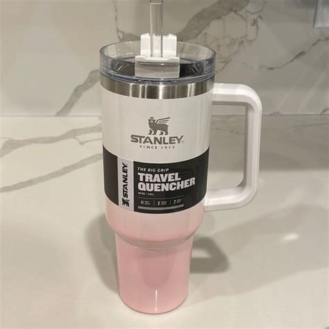 Pink gradient stanley cup - This Stanley® Quencher H2.0 is generously sized (but not oversized) with an easy-carry, comfort-grip handle and a narrow base that will fit most cup holders. Long day of meetings? Rowing class? Trip out of town? Stanley's durable 30 oz. tumbler, made with recycled stainless steel, is up to the hydration challenge.
